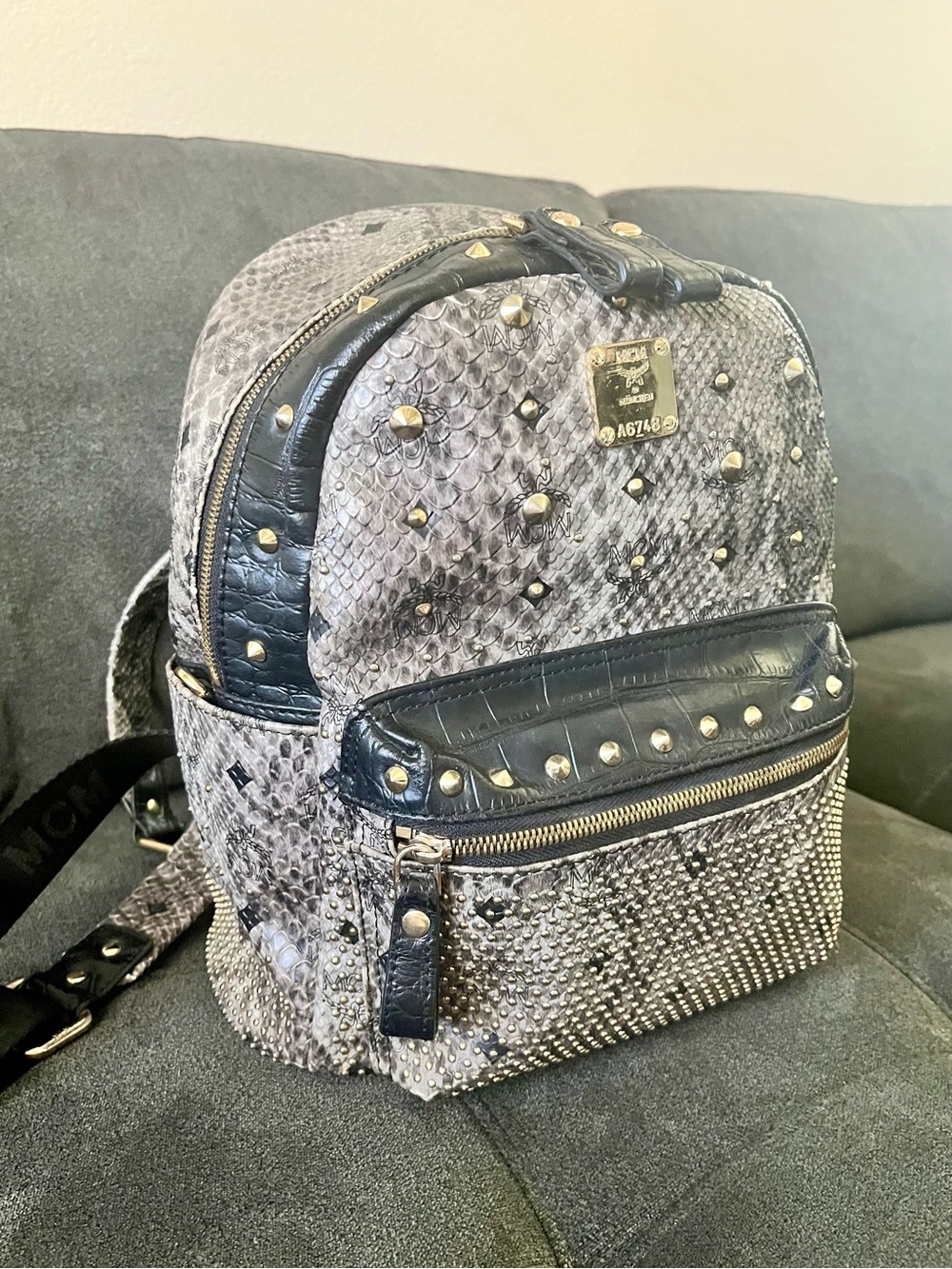 MCM Authentic Snake-Print Backpack with Gold Studs